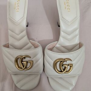 Gucci Women's Cream Mules with Gold Logo Size 6.5